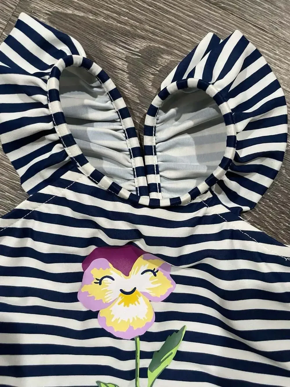Size 6-12 months babyGap Baby Girls Navy and White Striped Ruffle Swimsuit